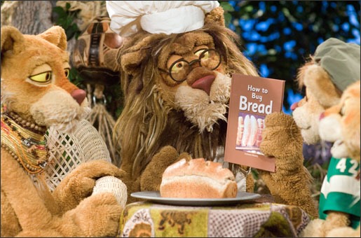 Theo reads a book to his family on PBS KIDS® series Between the Lions.<br /><br /><br /><br /><br /><br />
Credit: WGBH<br /><br /><br /><br /><br /><br />
